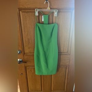 Solid green mini dress with open back